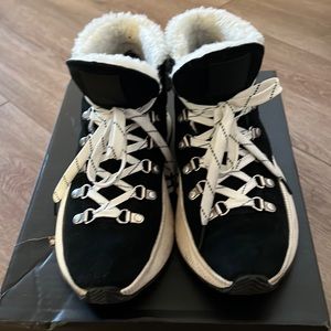 Sorel black winter boots with fur ankle and tongue